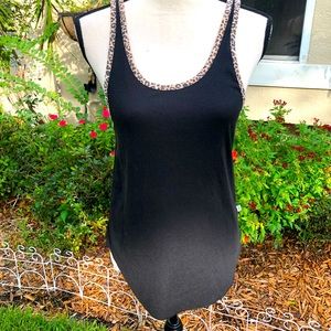 PINK,  black scoop neck tank top with cheetah detailed edges.  Size large